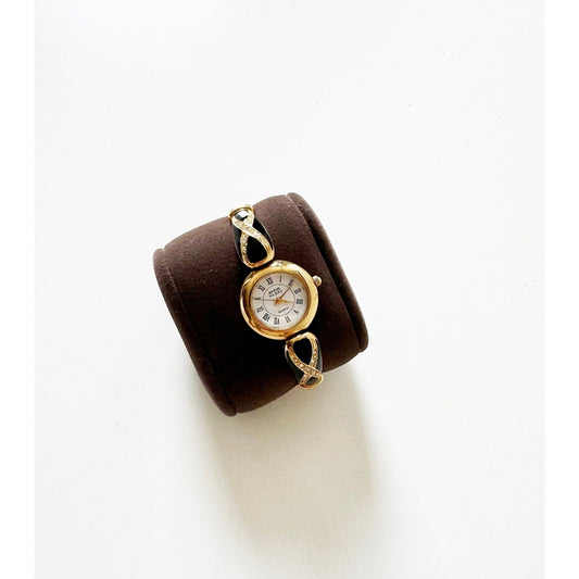 Vintage Small Gold Watch with Black Circular Crystal Face | Anne Klein